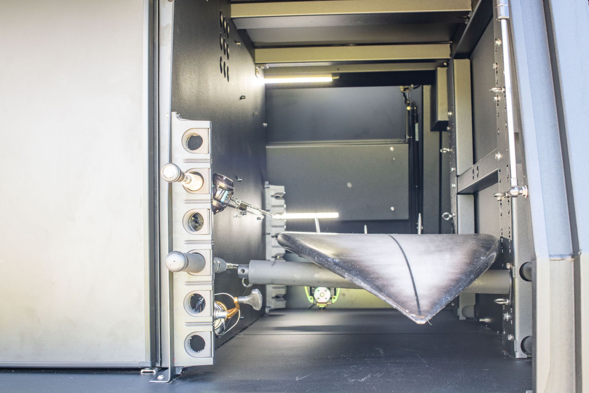 Interior of Industrial Machine With a Triangular Component and Lighting — Custom RV Creations in Sumner, QLD