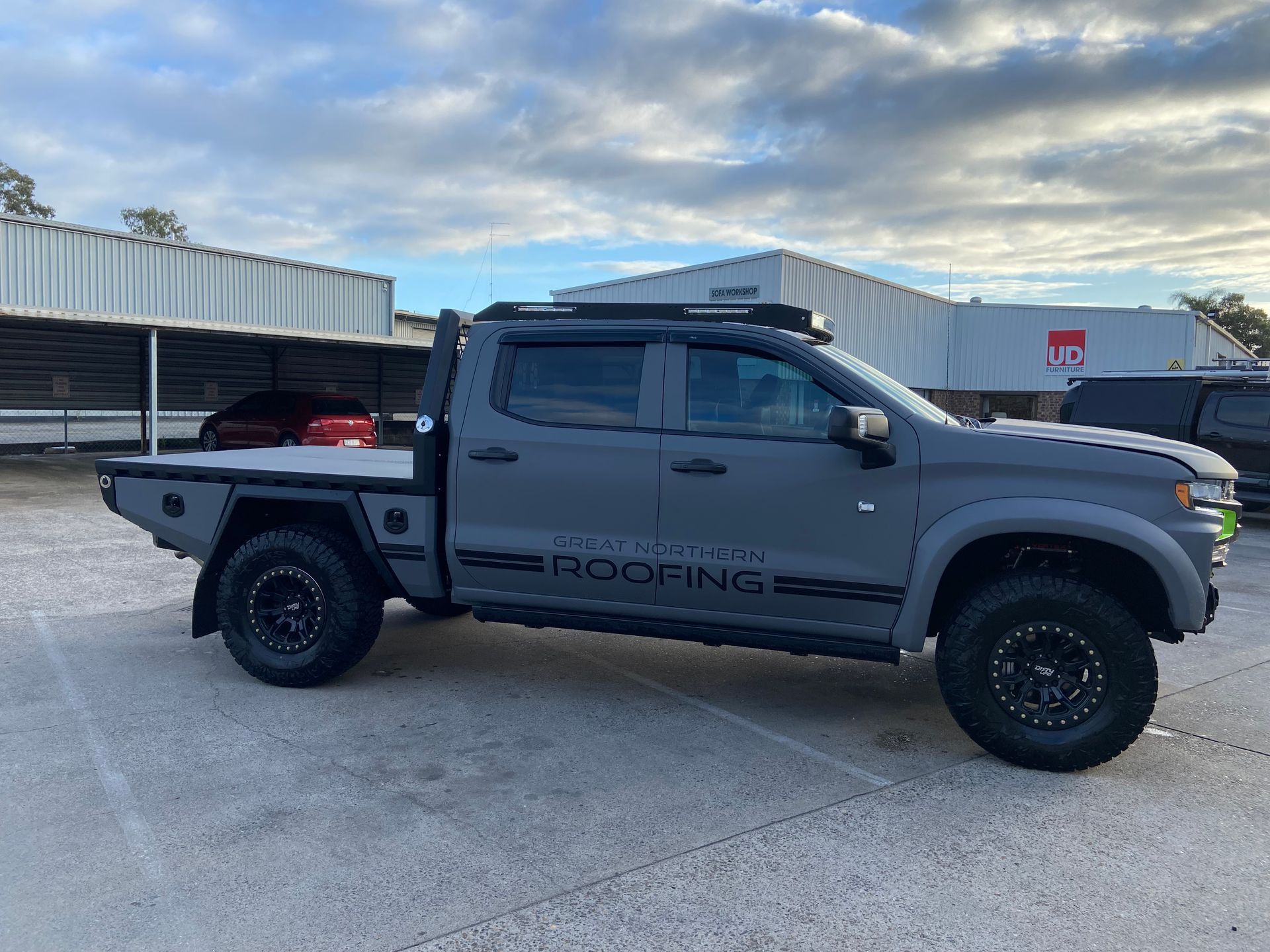 Grey Pickup Truck With Flatbed and Black Wheels — Custom RV Creations in Sumner, QLD