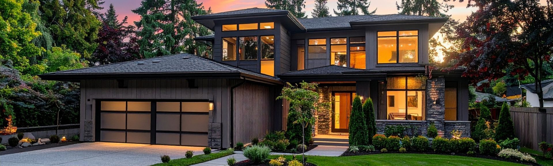 Exterior twilight photo of a luxury detached home.