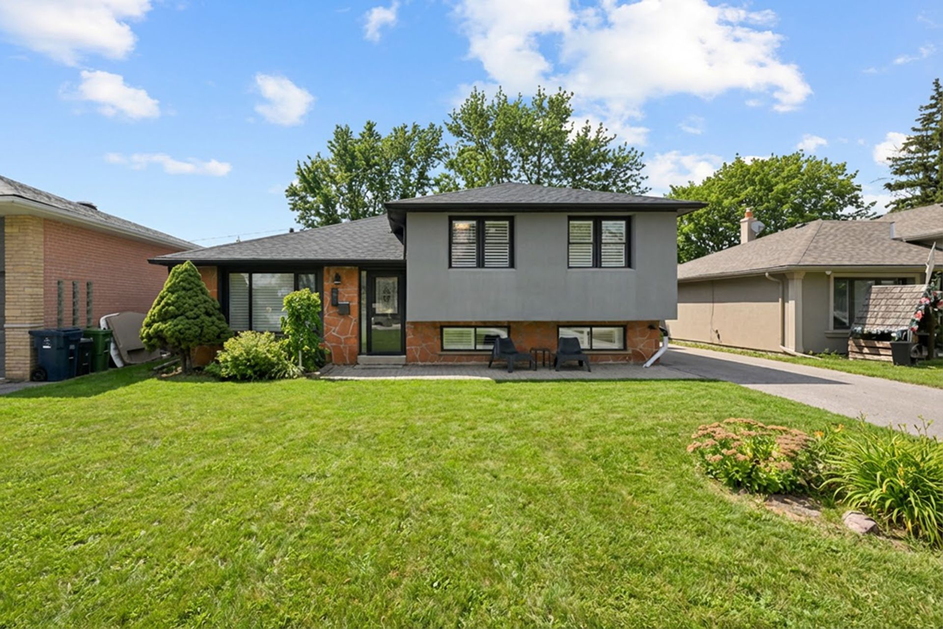 Modern upgraded home for sale in Etobicoke West Mall Toronto W08 with private driveway and garage