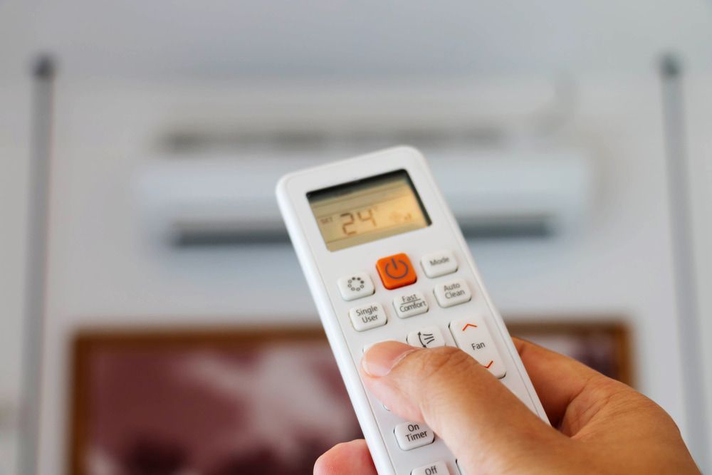 A Remote of a, Air Conditioner — Gordon's Air Conditioning & Refrigeration Services in Caboolture, QLD