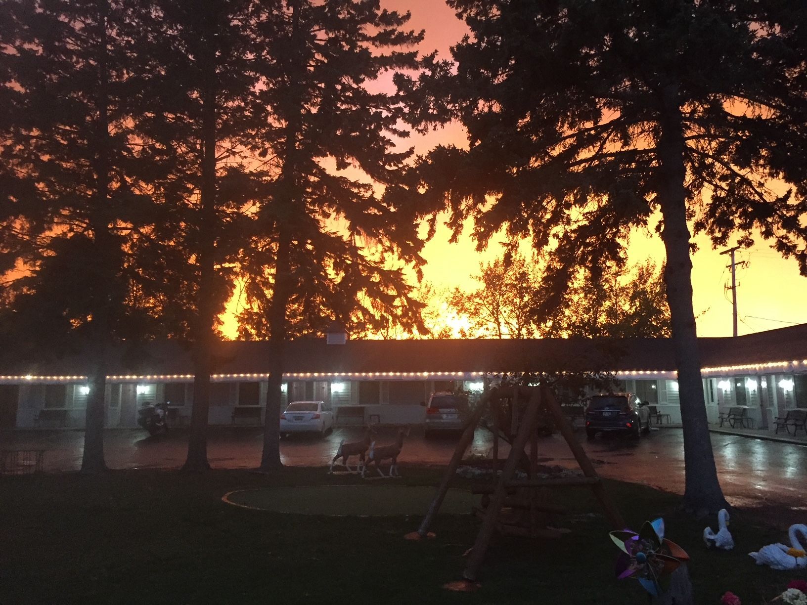 A motel with a sunset in the background