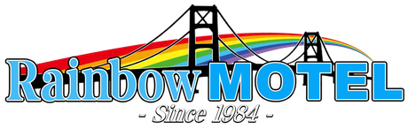 A rainbow motel logo with a bridge in the background