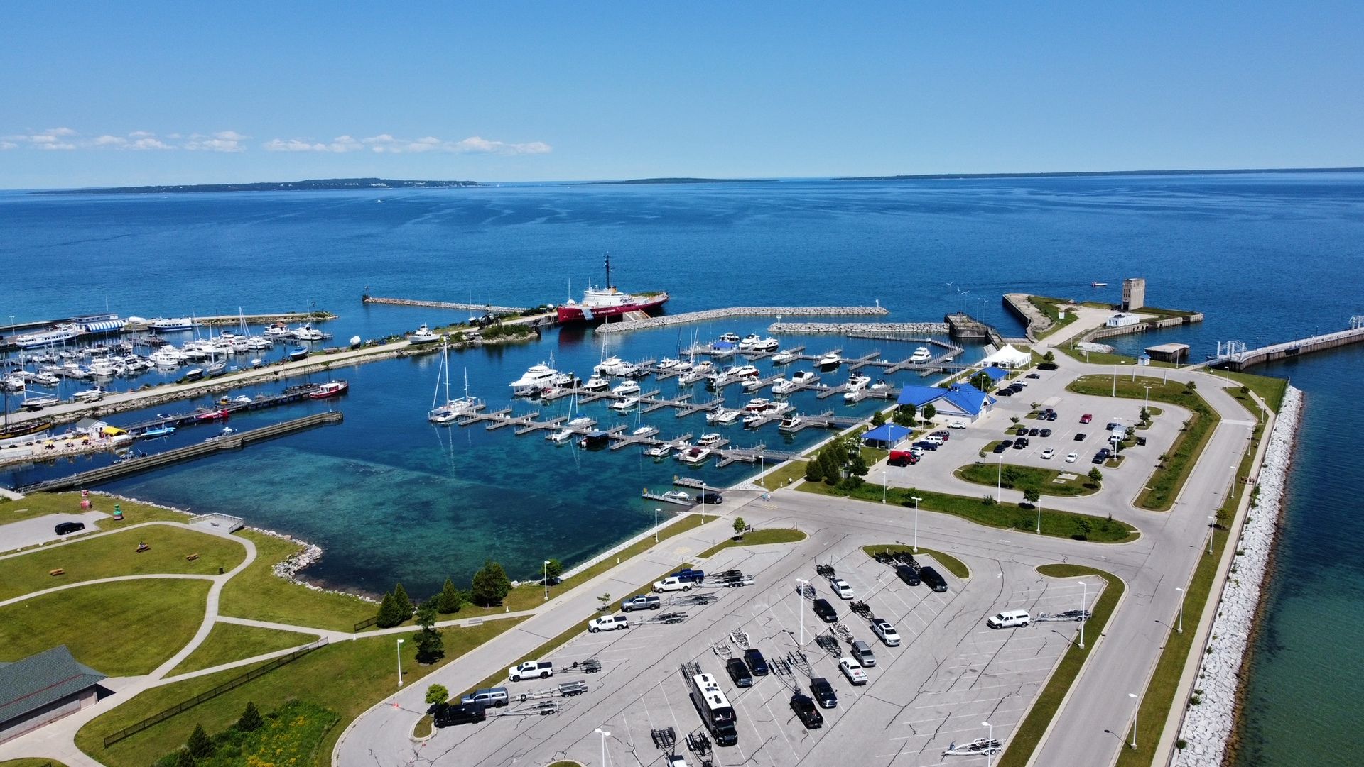 An aerial view of a marina with boats in the water