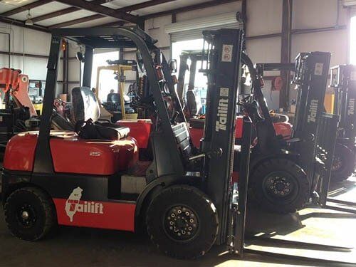 Parked Forklift — Servicing Equipment in Fort Worth, TX