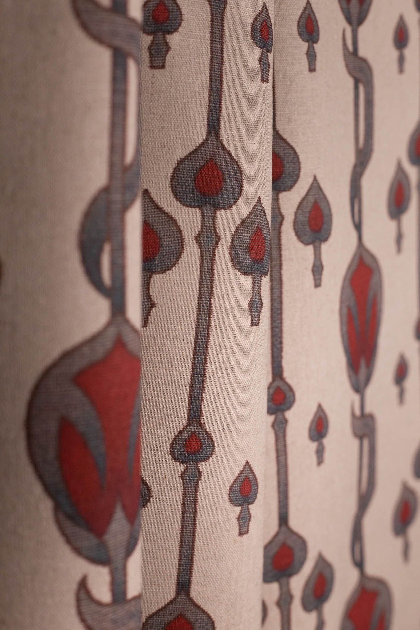 A close up of a curtain with a pattern on it