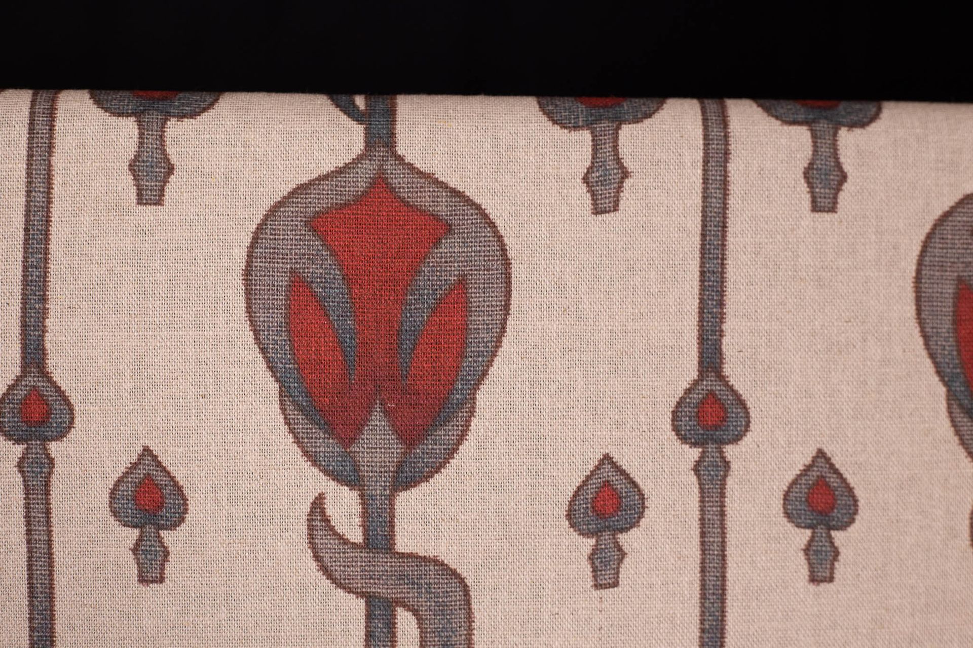 A close up of a fabric with a snake on it.