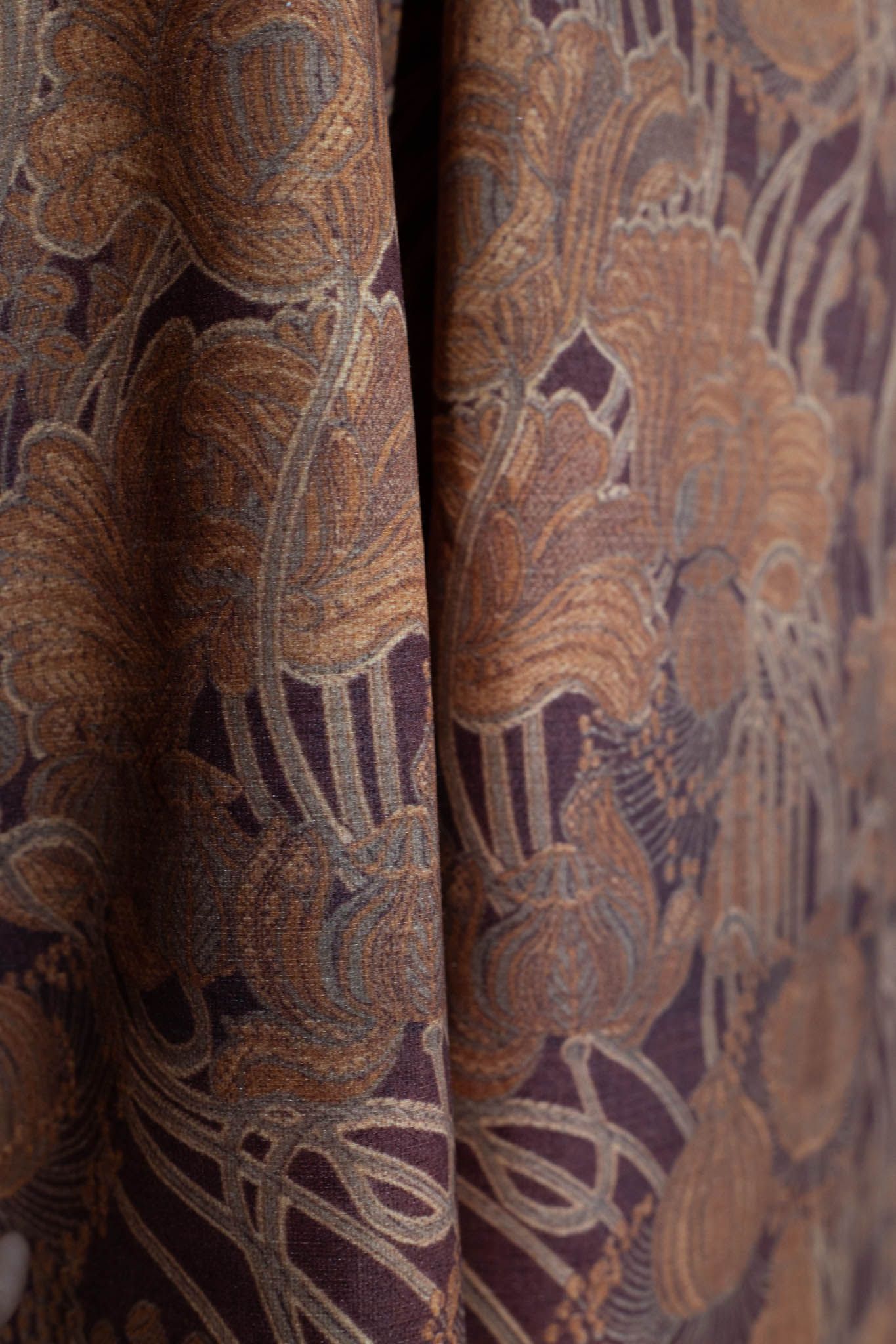 A close up of a piece of fabric with a floral pattern on it.