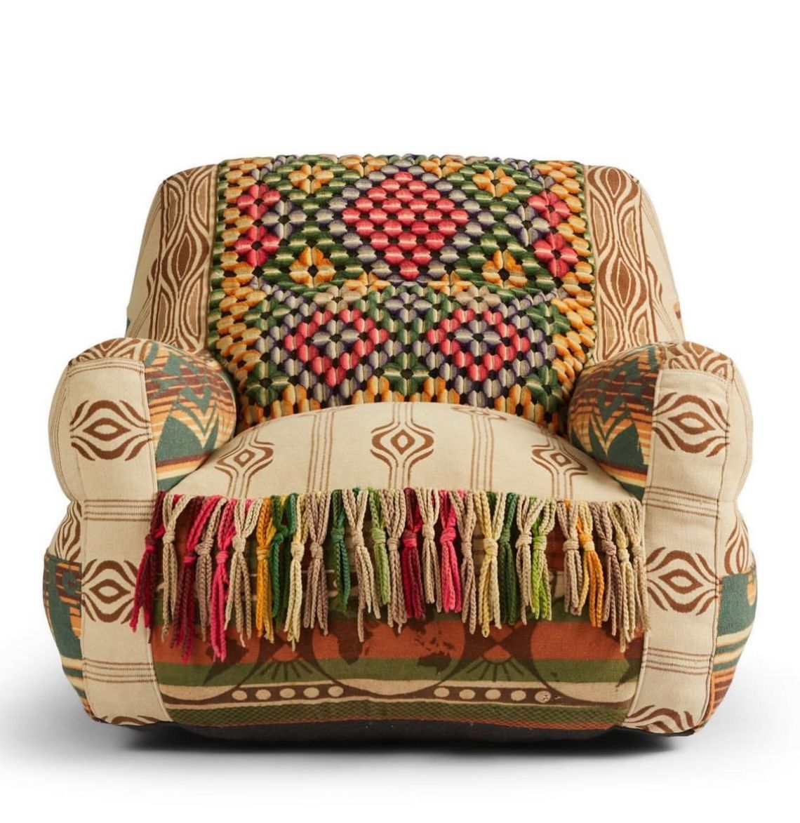 A chair with a colorful blanket on it