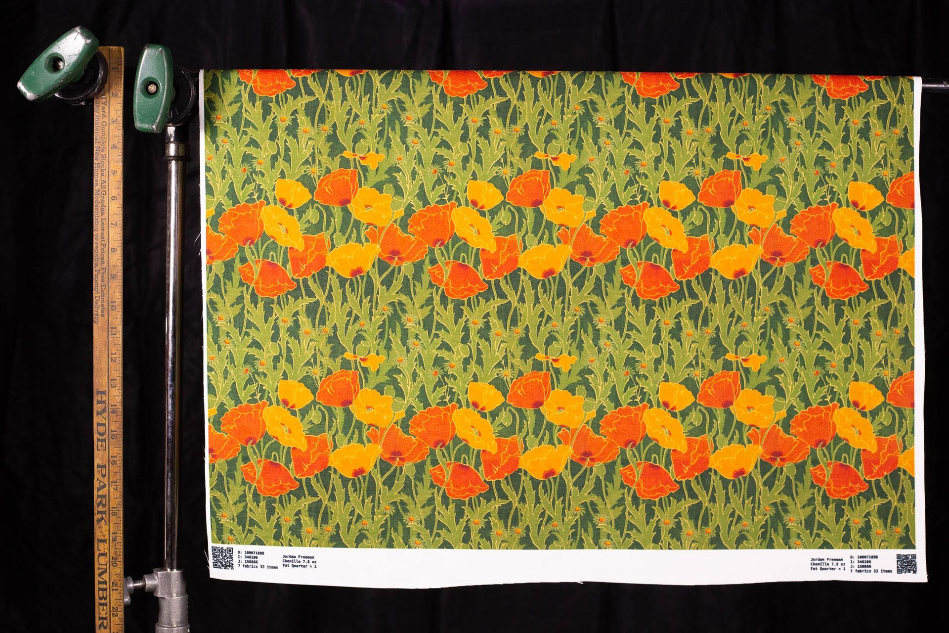 A piece of paper with orange and green flowers on it