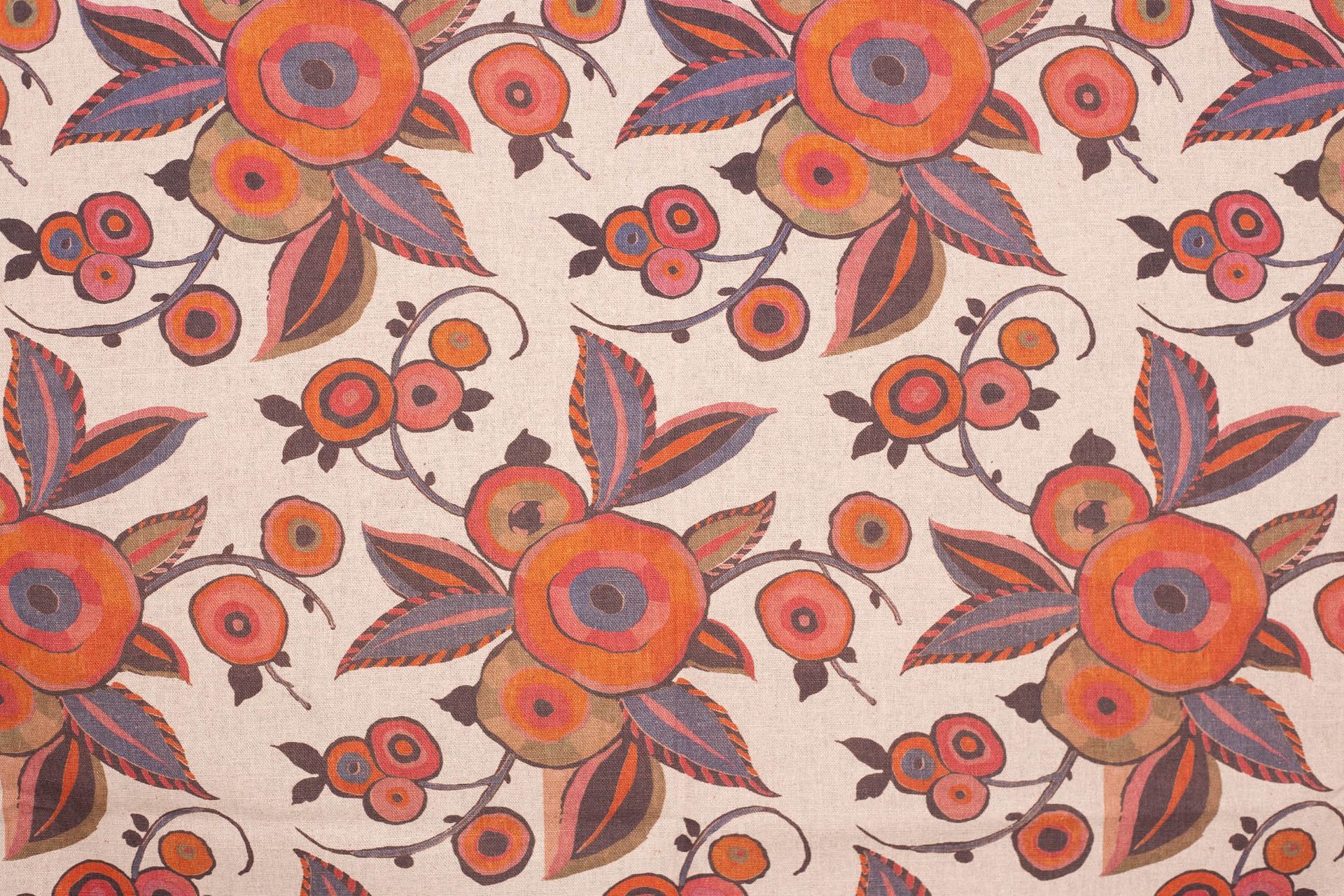 A close up of a curtain with a floral pattern on it.