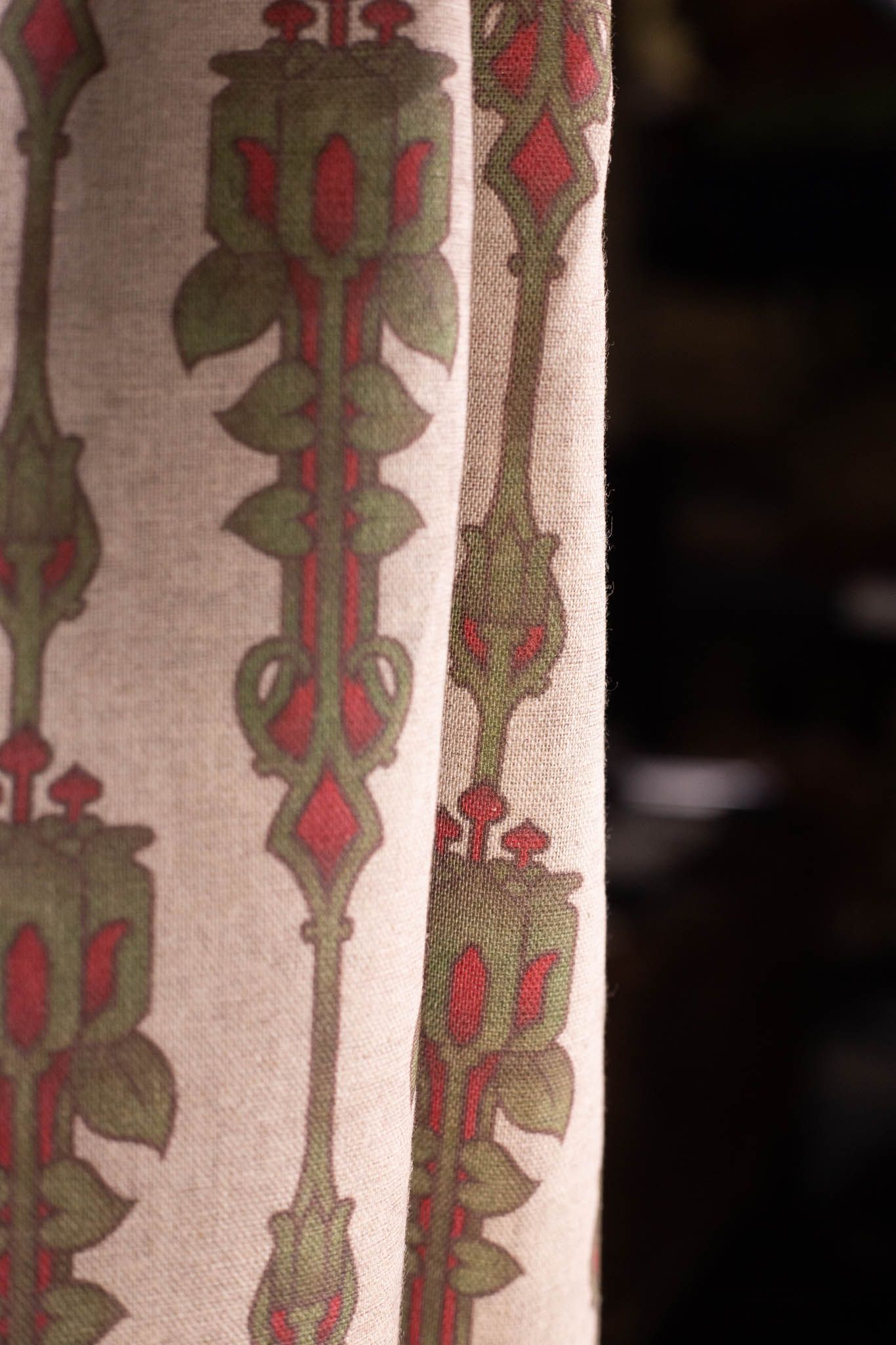 A close up of a curtain with a pattern on it