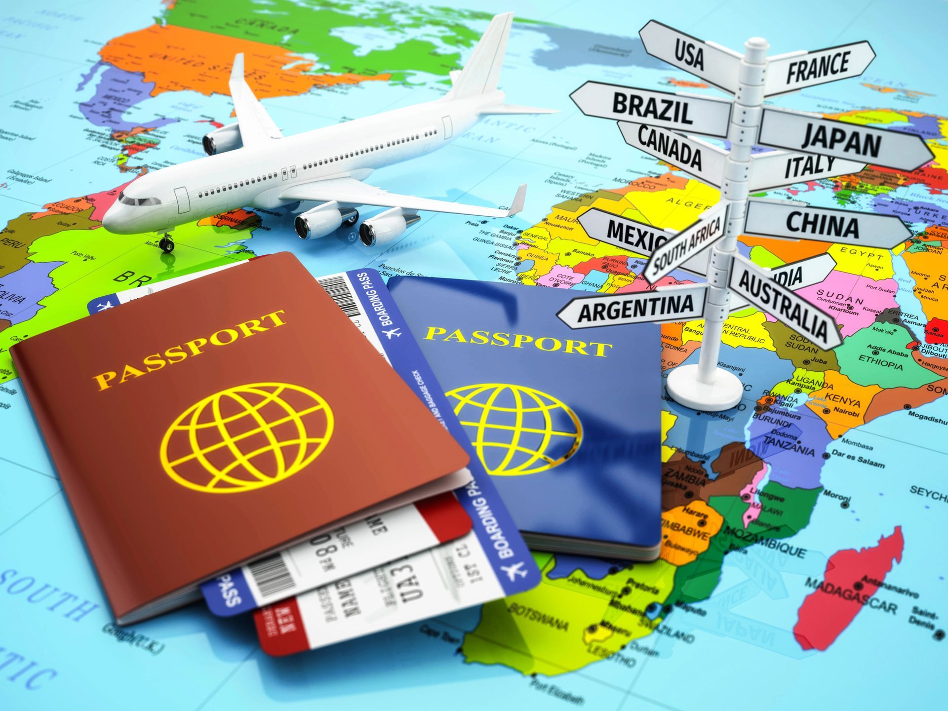 A passport , airline tickets , and an airplane on a map.