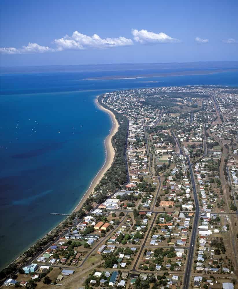 An aerial view of a city next to a body of water — Active Tree Fellas in Burrum Heads, QLD