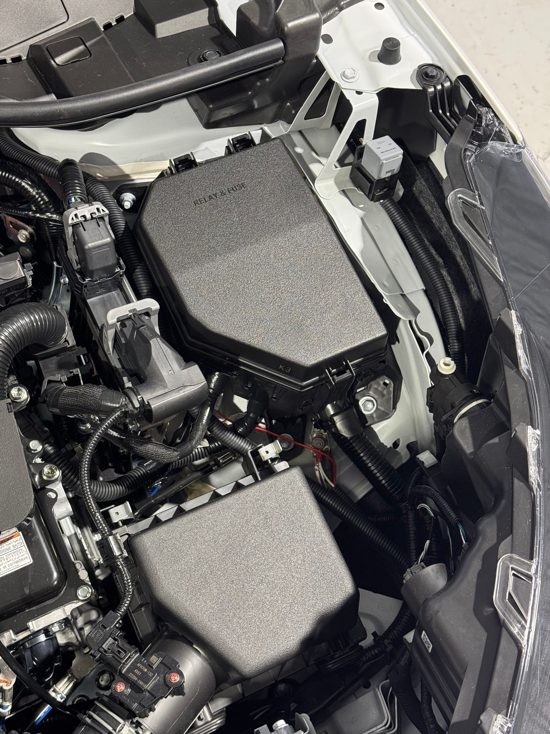 Electrics Under An Engine — Axton Automotive Services in Kunda Park, QLD