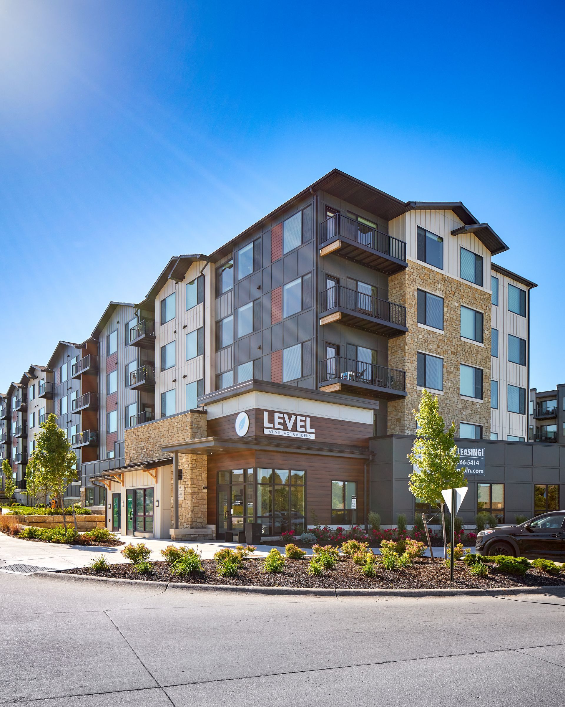 A large apartment building with a sign that says level on it