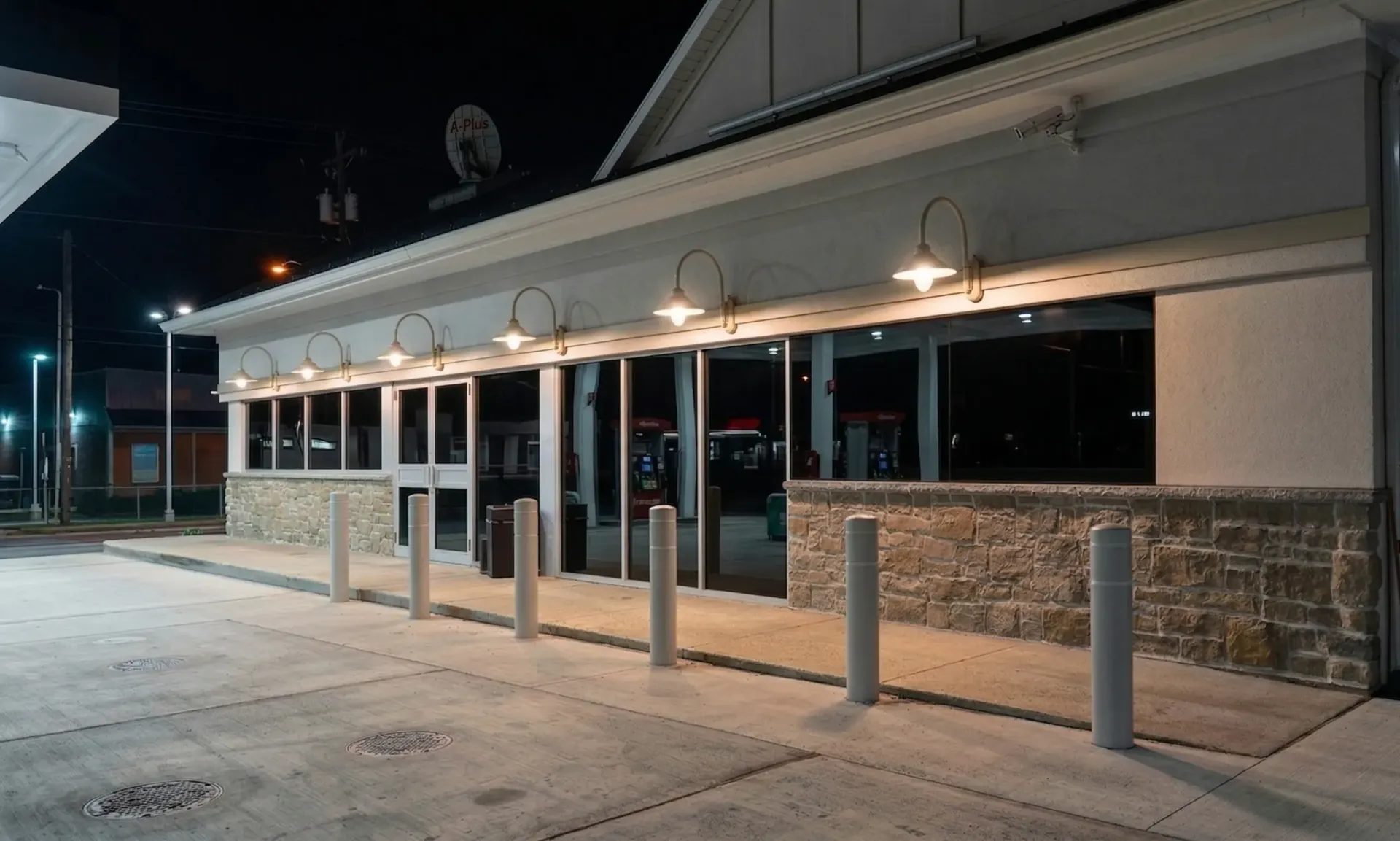 Brick building storefront with sign reading