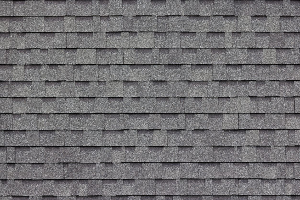 A close up of a roof with shingles on it.