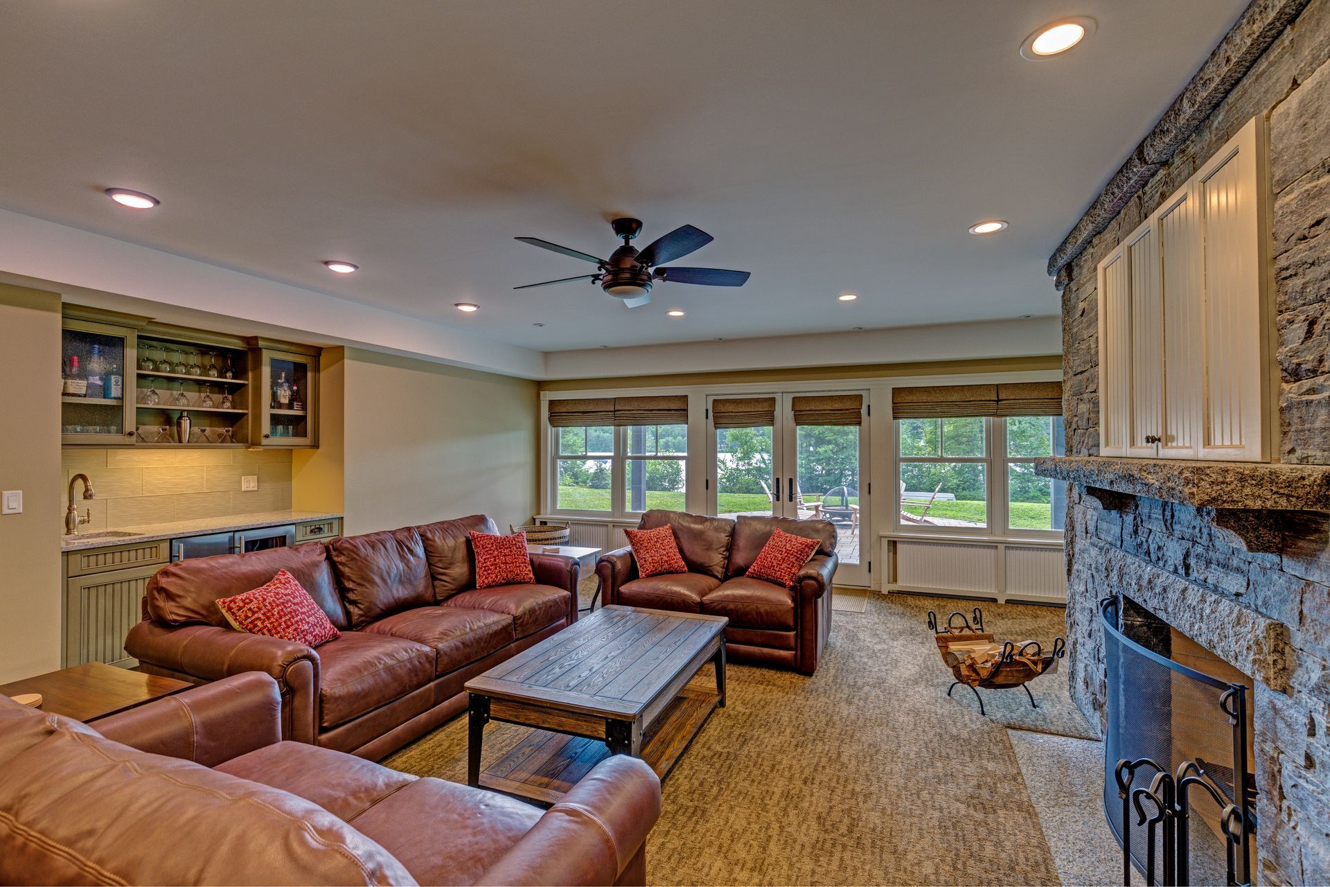 A living room filled with furniture and a fireplace.