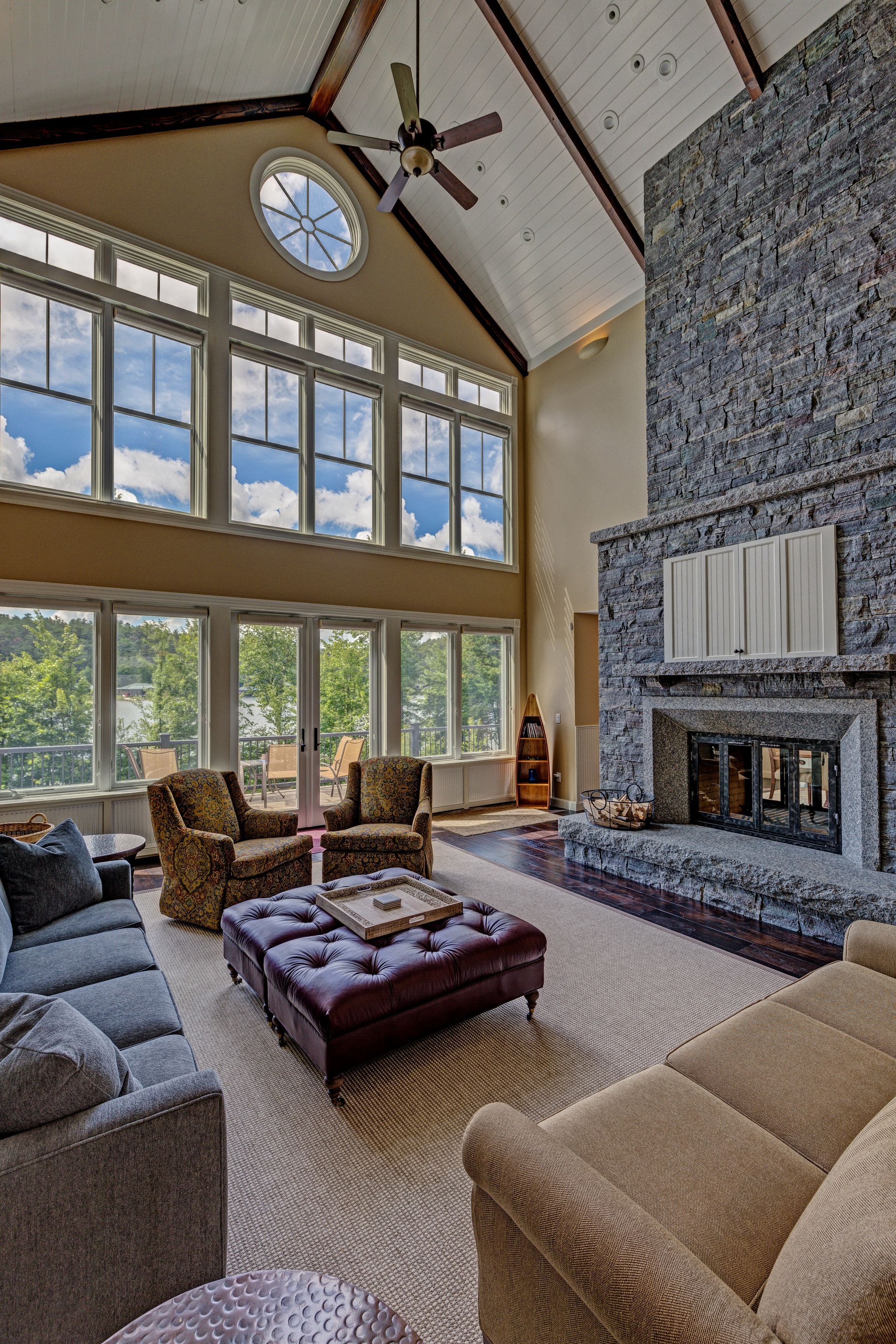 A living room filled with furniture and a fireplace.