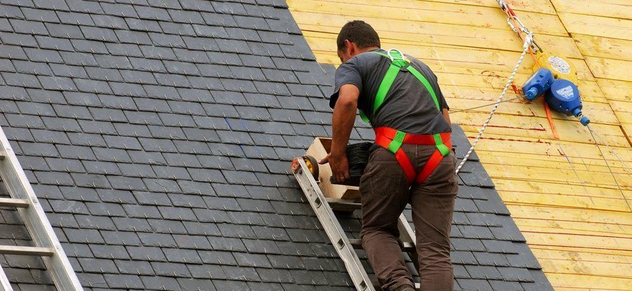 Man laying shingles