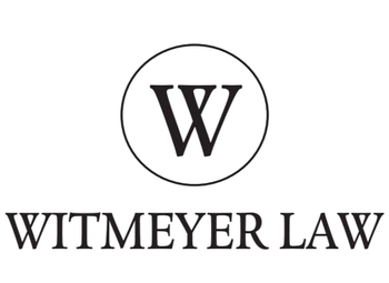 A black and white logo for witmeyer law with a letter w in a circle.