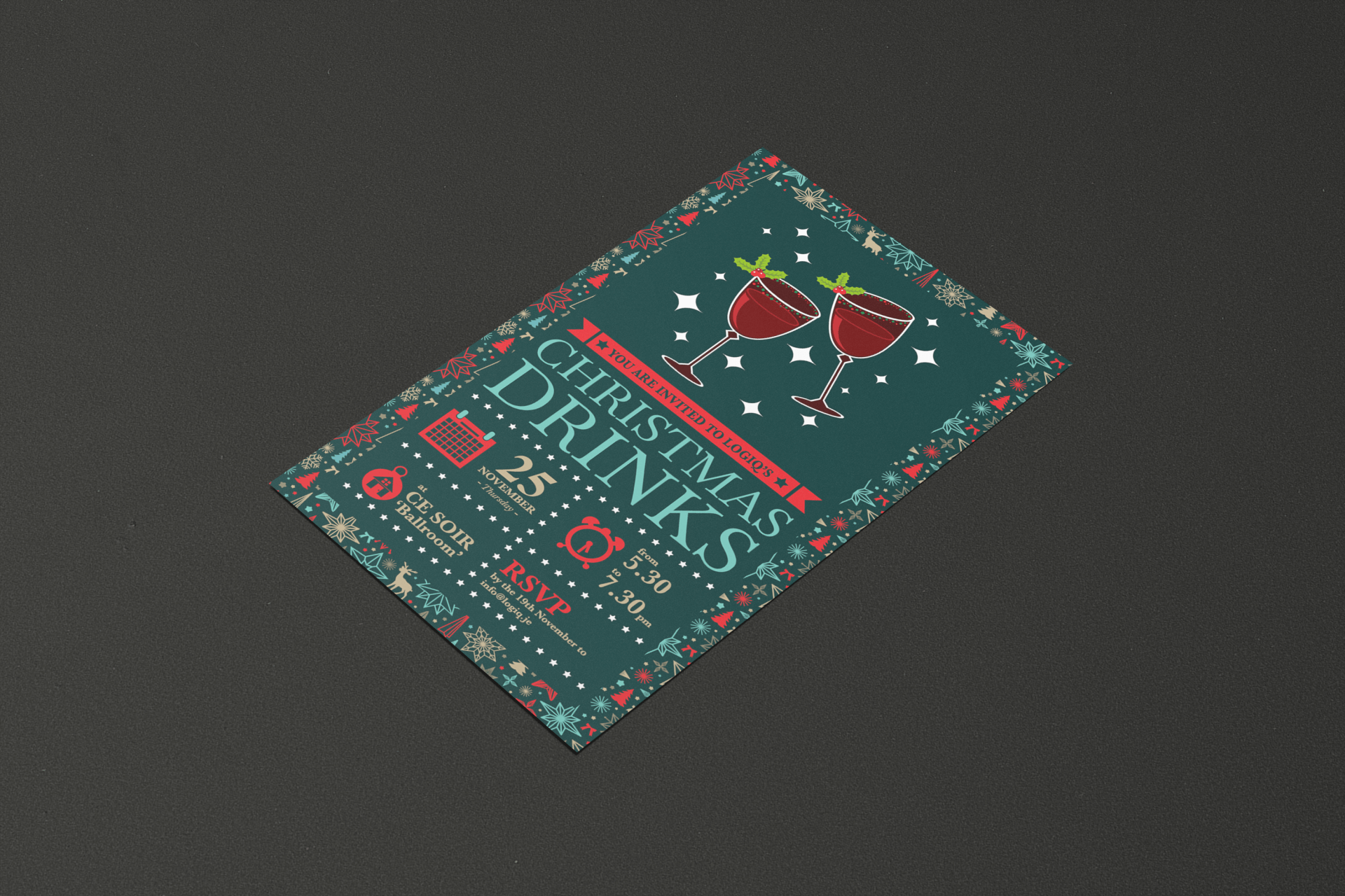 A christmas drinks flyer is laying on a black surface.