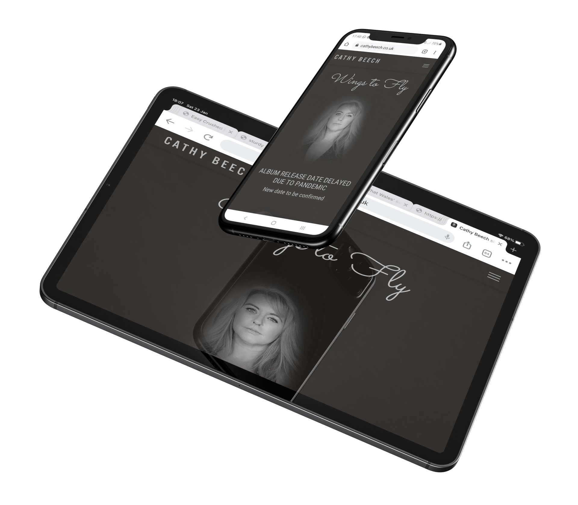 A cell phone is sitting on top of a tablet