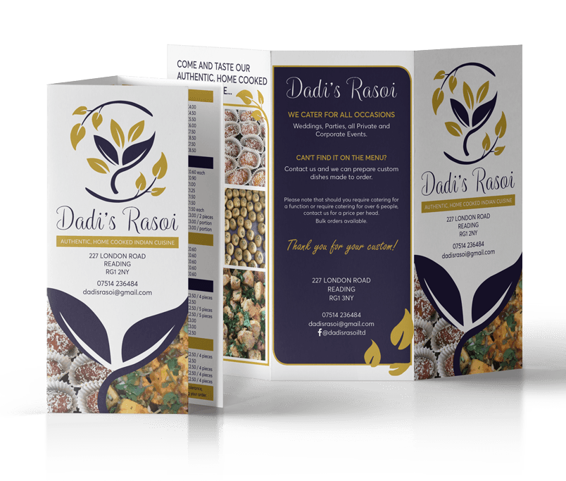 A brochure for dadi 's rasoi is sitting on a table.