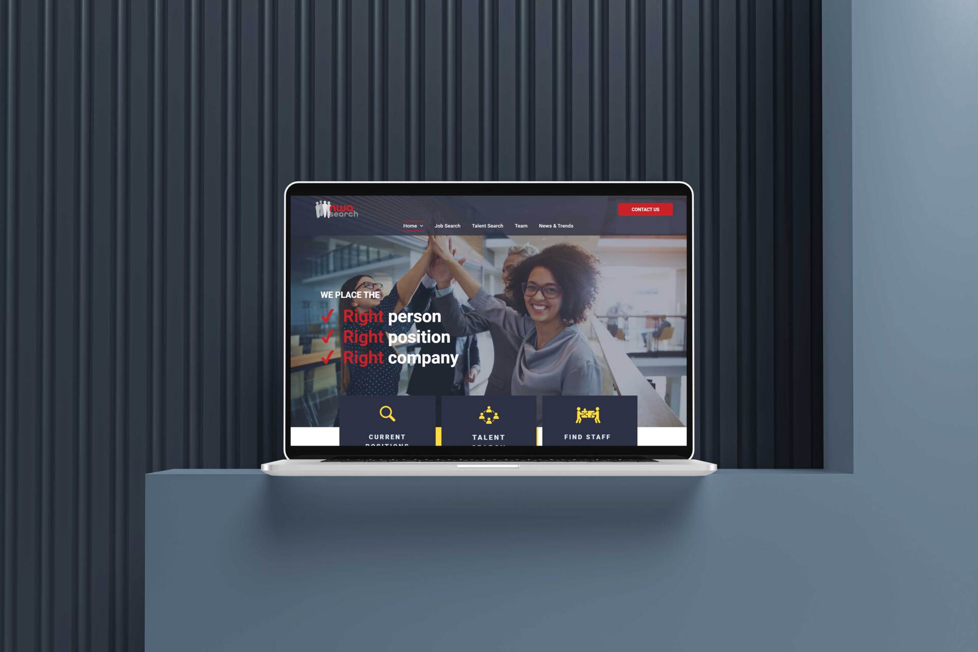 A laptop computer is sitting on a table with a website on the screen.