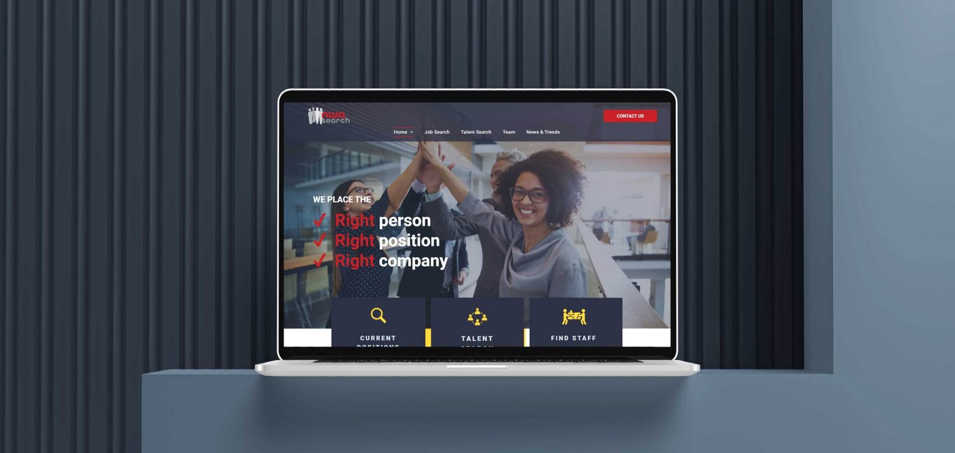 A laptop computer is sitting on a table with a website on the screen.