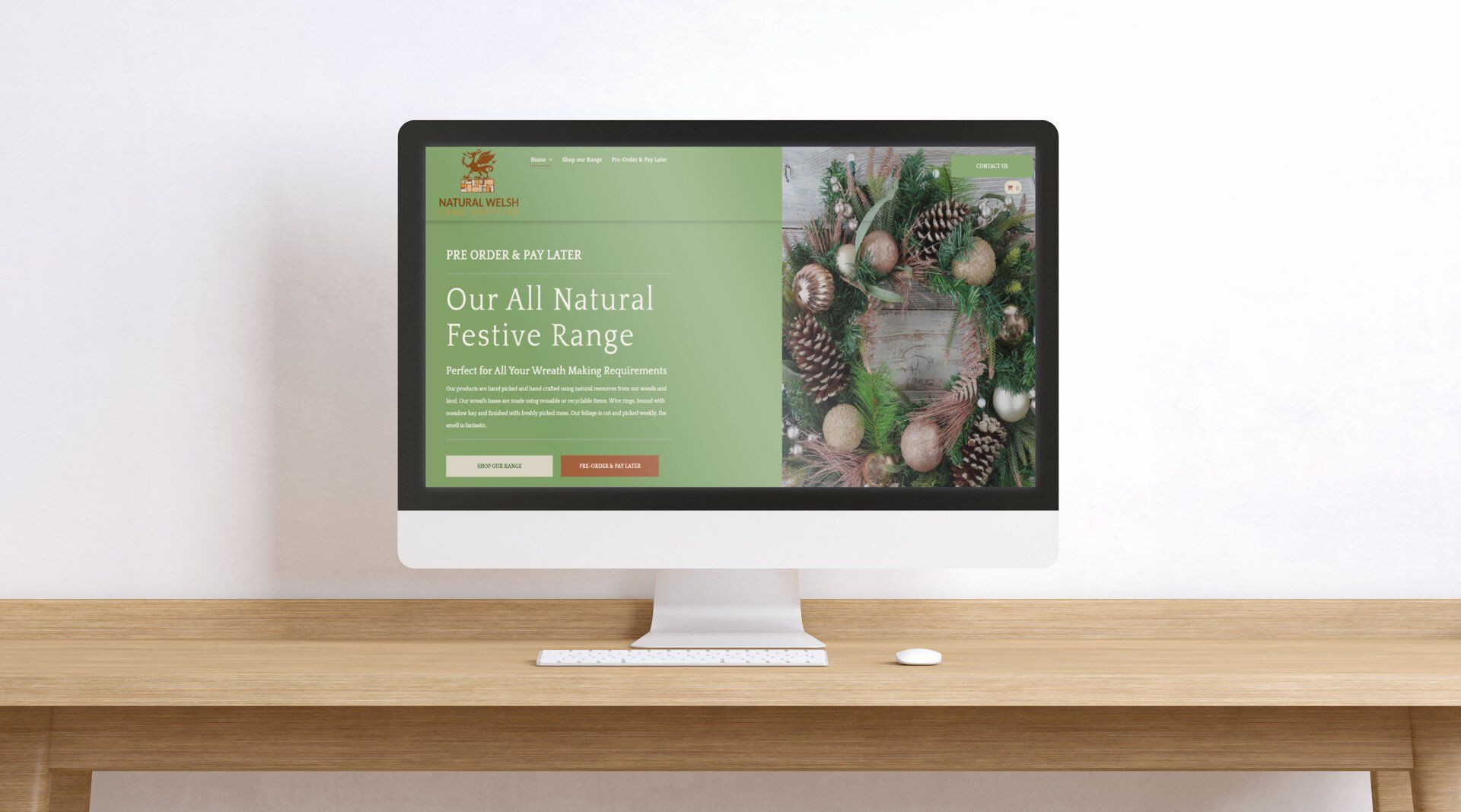 A computer monitor is sitting on a wooden desk.