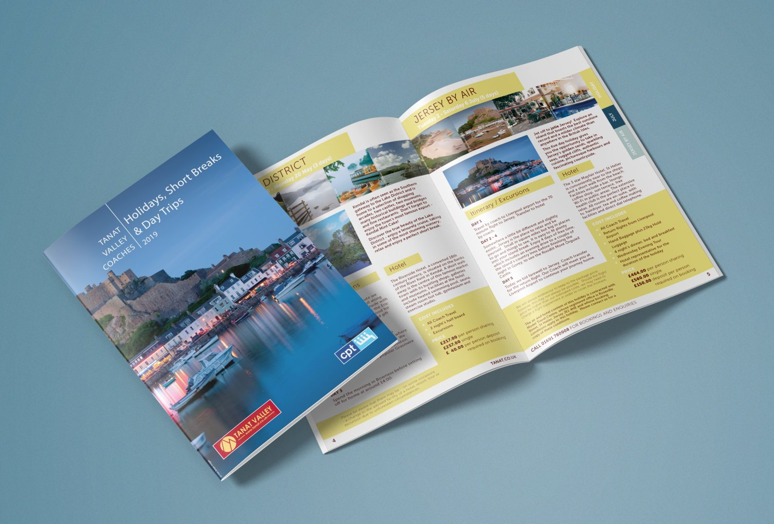 A brochure is open to a page with a picture of a body of water.