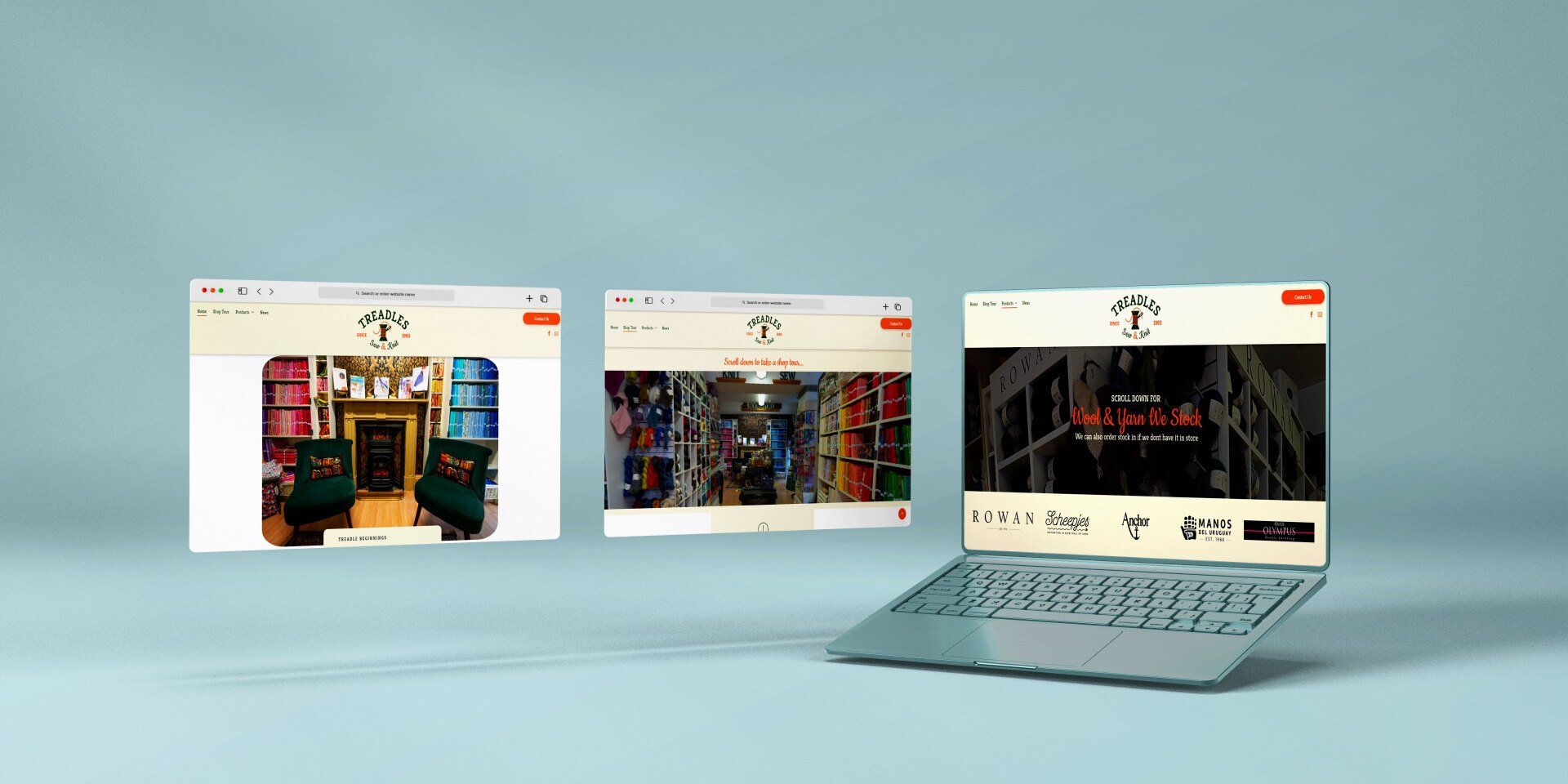 A laptop computer is sitting on a table next to three screens.