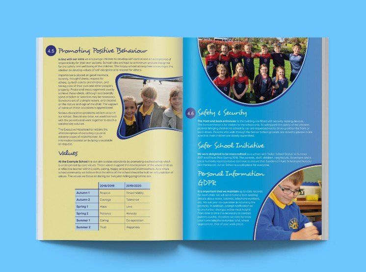 A book is open to a page with a picture of a group of children.