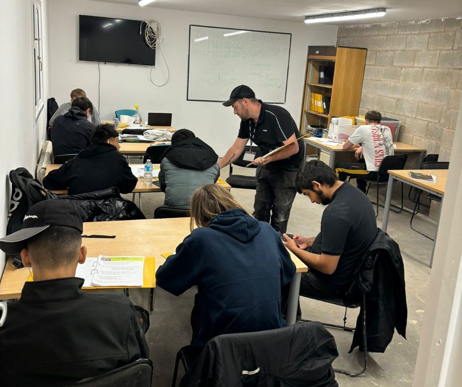 Learners completing the CSCS test at Chameleon School of Construction.