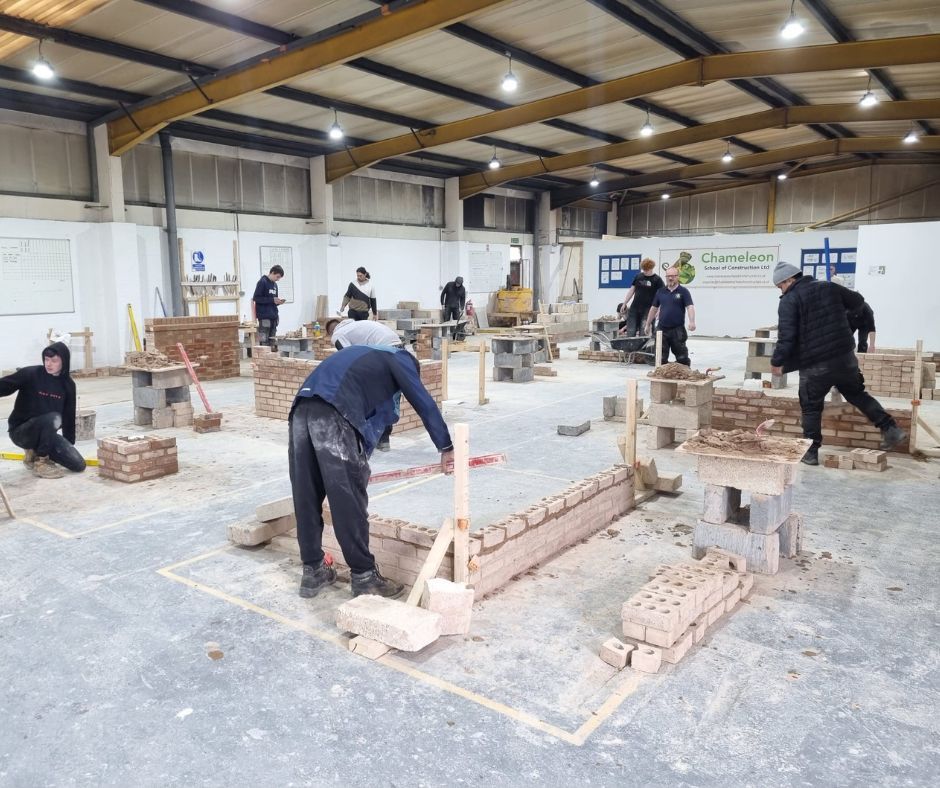 Students are gaining hands-on experience in bricklaying training at Chameleon School of Construction