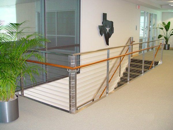 A Staircase with A Texas Flag on The Wall