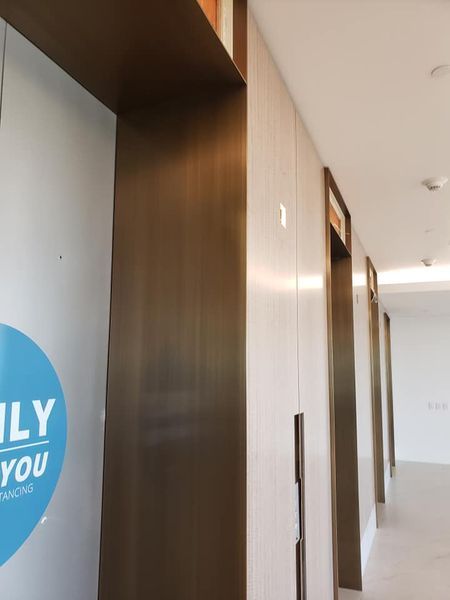 A Hallway with A Sign