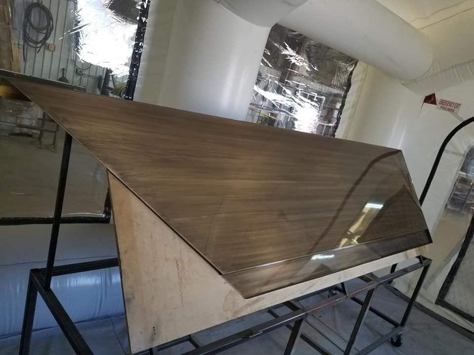 A Piece of Wood Is Sitting on Top of A Wooden Table