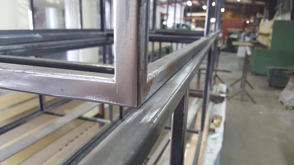 A Close up Of a Metal Railing in A Factory