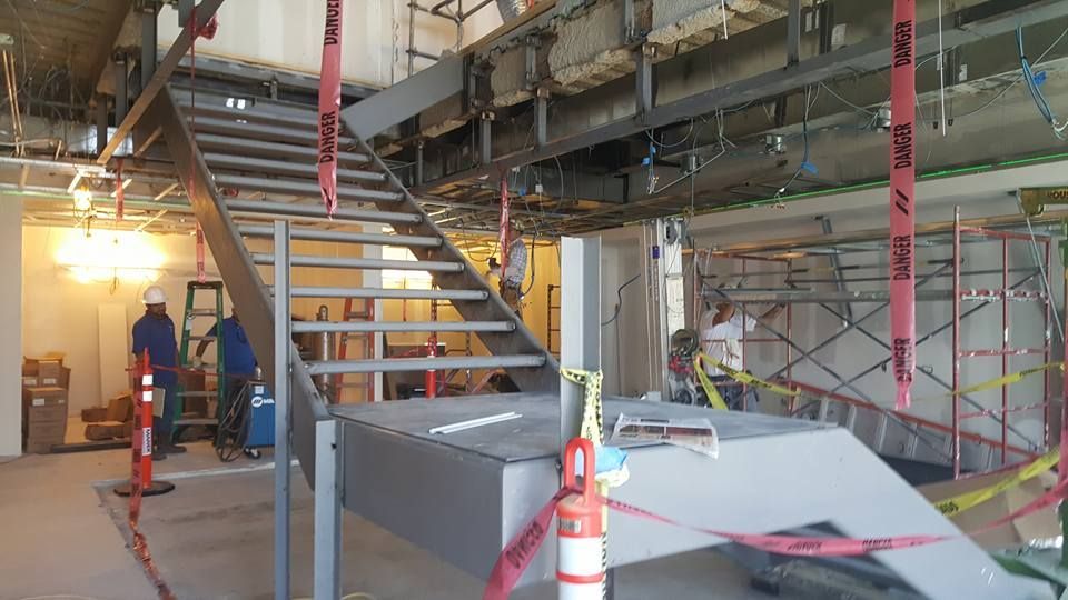 A Metal Staircase Is Being Built in A Building