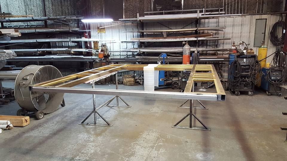 A Large Piece of Metal Is Sitting on A Table in A Workshop