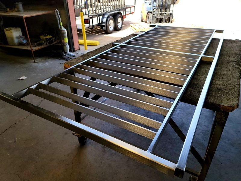 A Piece of Metal Is Sitting on A Table in A Garage