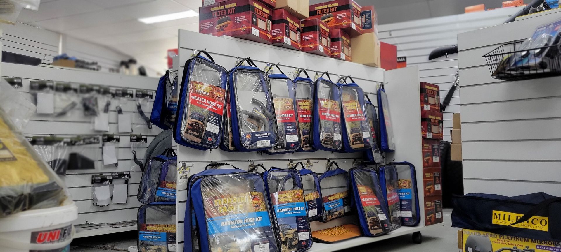 Dual exhaust pipes of a car, chrome, mounted under rear bumper.