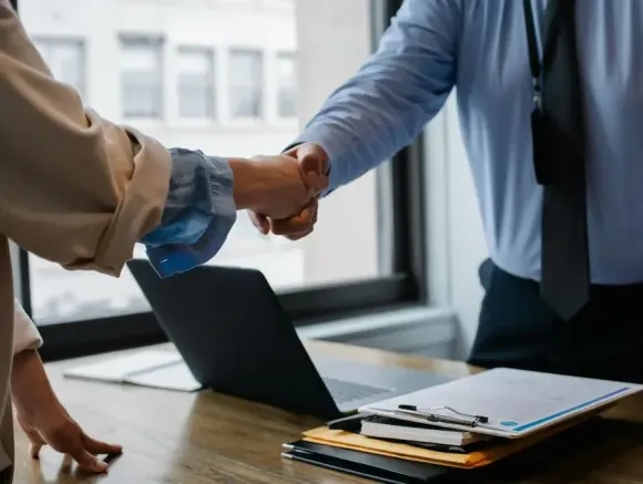 Two men shaking hands for digital marketing services.