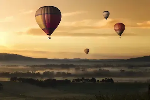Hot air balloons floating with beautiful scenery. Float above the competition with Florida Coast SEO.