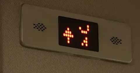 Elevator sign going up to the next level, how your business can go to the next level.