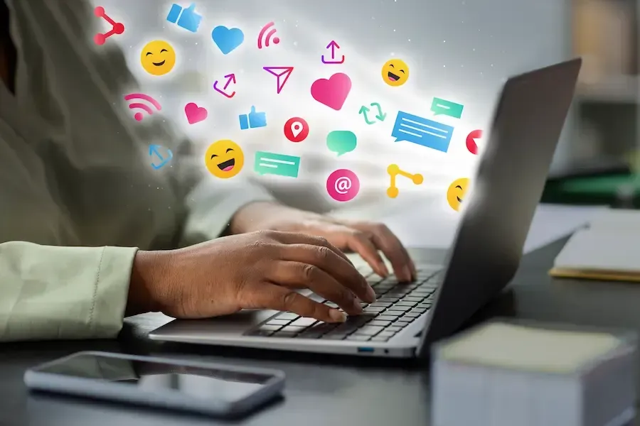Florida Coast SEO person providing social media management services on a computer
