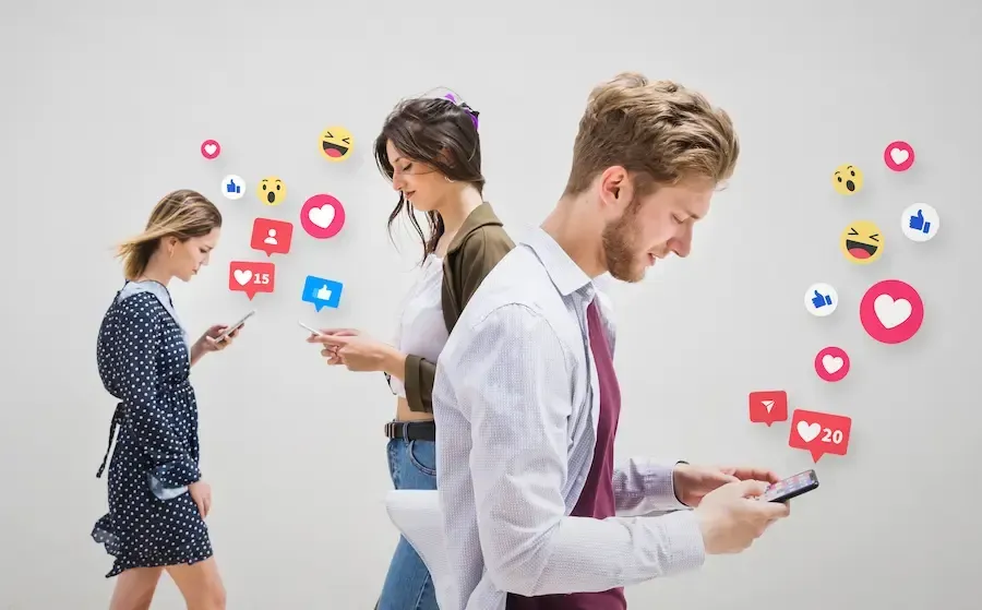 People doing social media on their cell phones. Social media advertising services are important.